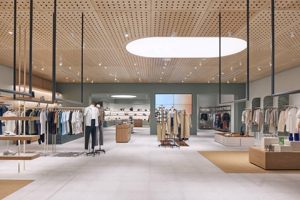 Premium retail store interior with product displays and wooden flooring.